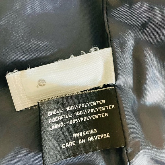 Polka dot half neck zip up vest. - Picture 3 of 5